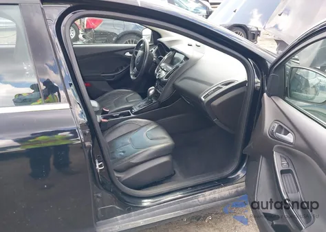 2016 Ford Focus Titanium z USA, uszkodzony, nr VIN 1FADP3J27GL215436